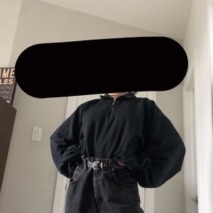 Oversized black collard sweater.